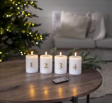 Flamme Advent LED-kubbelys 4-pakning 7,5 cm - hvit med gullsifre - Belysning - Dekorasjonsbelysning - Dekorativ innendørsbelysning - Batteridrevne lys
