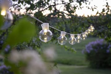 Partaj lysslynge - transparent med hvit kabel - Belysning - Dekorasjonsbelysning - Dekorativ utendørsbelysning - Lyslenke utendørs