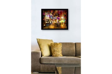 Innrammet lerretsbilde i tre - 41x56 cm - Livlig byscene med neonlys og mennesker i bevegelse - Lilla / Gul / Oransje - Interiør - Maleri & posters - Lerretsbilder