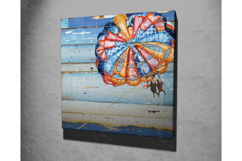 Lerretsbilde 45x45 cm - Fargerik fallskjerm med to personer som svever over havet - Blå / Oransje / Rød - Interiør - Maleri & posters - Lerretsbilder