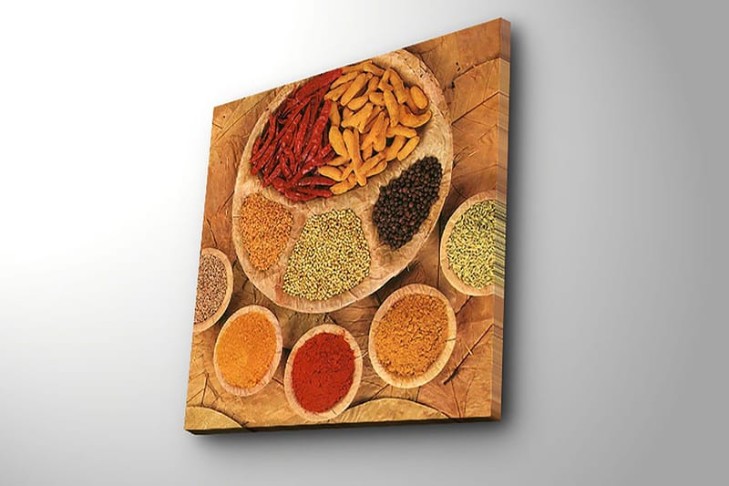 Lerretsbilde 45x45 cm - Fargerik samling av krydder og urter på en rund tallerken - Rød / Gul / Brun - Interiør - Maleri & posters - Lerretsbilder