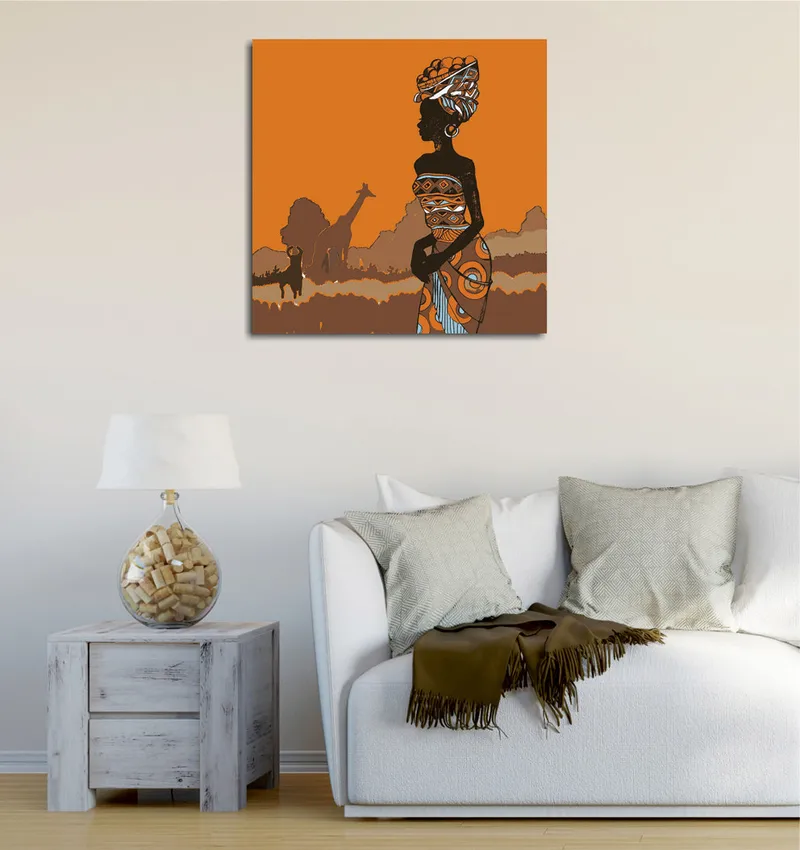 Lerretsbilde 45x45 cm - Silhuett av en kvinne i tradisjonelle klær mot en oransje bakgrunn, Oransje / Svart / Brun