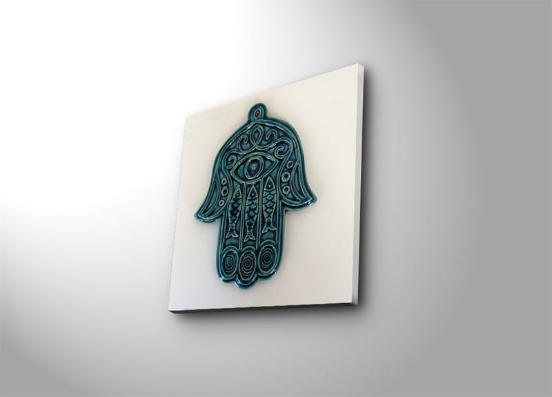 Lerretsbilde 45x45 cm - Symbolsk hånd med øye og intrikate mønstre, Turkis / Hvit