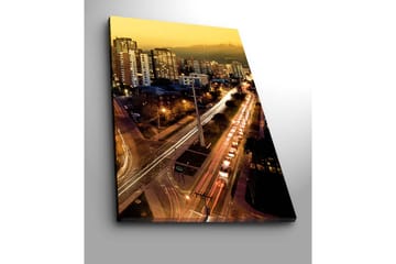 Lerretsbilde 70x100 cm - Bysilhuett i skumringen med lys fra bygninger og trafikk - Gull / Mørk blå / Hvit - Interiør - Maleri & posters - Lerretsbilder