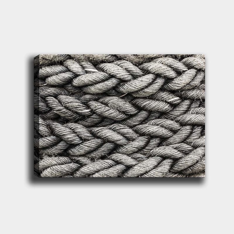 Lerretsbilde 70x100 cm - Detaljert nærbilde av flettet tau med en tekstur som fremhever strukturen og materialiteten - Grå / Svart - Interiør - Maleri & posters - Lerretsbilder