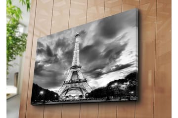 Lerretsbilde 70x100 cm - Eiffeltårnet i en dramatisk svart-hvitt-komposisjon - Svart / Hvit / Grå - Interiør - Maleri & posters - Lerretsbilder