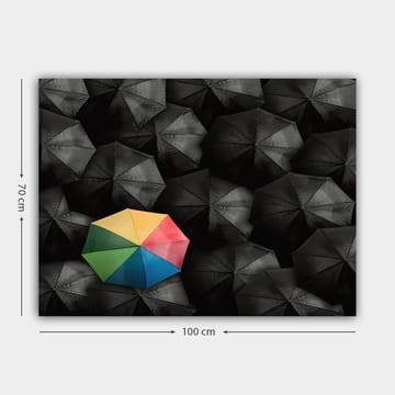 Lerretsbilde 70x100 cm - Ensom fargerik paraply blant en mengde svarte paraplyer - Svart / Gul / Rød - Interiør - Maleri & posters - Lerretsbilder