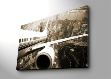 Lerretsbilde 70x100 cm - Et fly som svever over en by i skumringen - Svart / Hvit / Grå - Interiør - Maleri & posters - Lerretsbilder