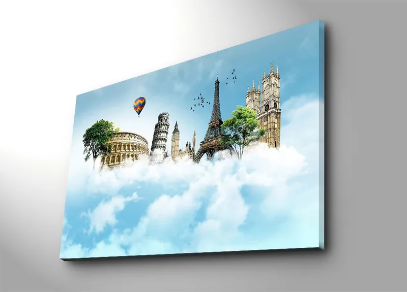 Lerretsbilde 70x100 cm - Fantasifullt landskap med berømte bygninger som svever blant skyer, Blå / Grønn / Hvit