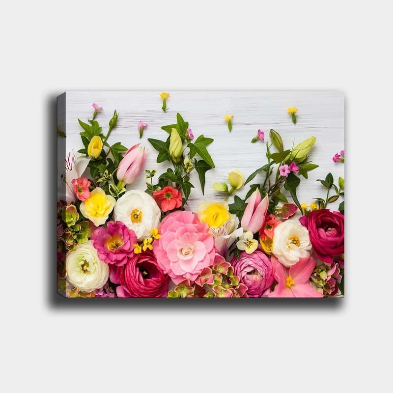 Lerretsbilde 70x100 cm - Fargerik blomsterbukett med forskjellige former og nyanser, Rosa / Hvit / Gul
