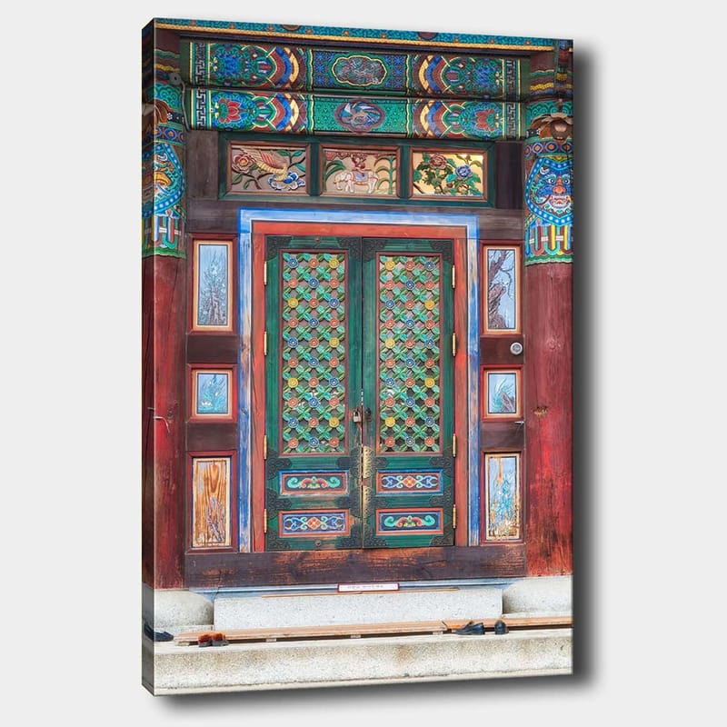 Lerretsbilde 70x100 cm - Fargerik og detaljert dør med tradisjonelle mønstre og dekorasjoner, Grønn / Rød / Blå