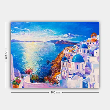 Lerretsbilde 70x100 cm - Fargerik utsikt over en gresk kystby med hvite bygninger og blå kupler som strekker seg mot havet - Blå / Hvit / Oransje - Interiør - Maleri & posters - Lerretsbilder