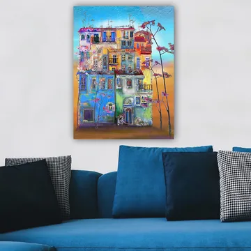 Lerretsbilde 70x100 cm - Fargerike hus i et urbant miljø med blomstrende trær i forgrunnen - Blå / Grønn / Oransje - Interiør - Maleri & posters - Lerretsbilder