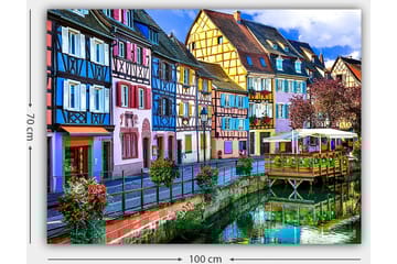 Lerretsbilde 70x100 cm - Fargerike hus langs en kanal i pittoreske urbane omgivelser - Blå / Rosa / Gul - Interiør - Maleri & posters - Lerretsbilder