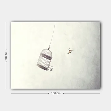 Lerretsbilde 70x100 cm - Fuglebur hengende i luften med en fugl som flyr i nærheten - Grå / Svart / Hvit - Interiør - Maleri & posters - Lerretsbilder
