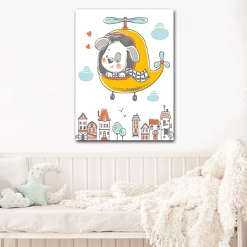 Lerretsbilde 70x100 cm - Glad hund som flyr i et gult helikopter over en by med fargerike hus - Gul / Grå / Blå - Interiør - Maleri & posters - Lerretsbilder