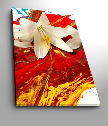 Lerretsbilde 70x100 cm - Hvit lilje som står frem mot en bakgrunn av intense røde og gule farger - Rød / Gul / Hvit - Interiør - Maleri & posters - Lerretsbilder