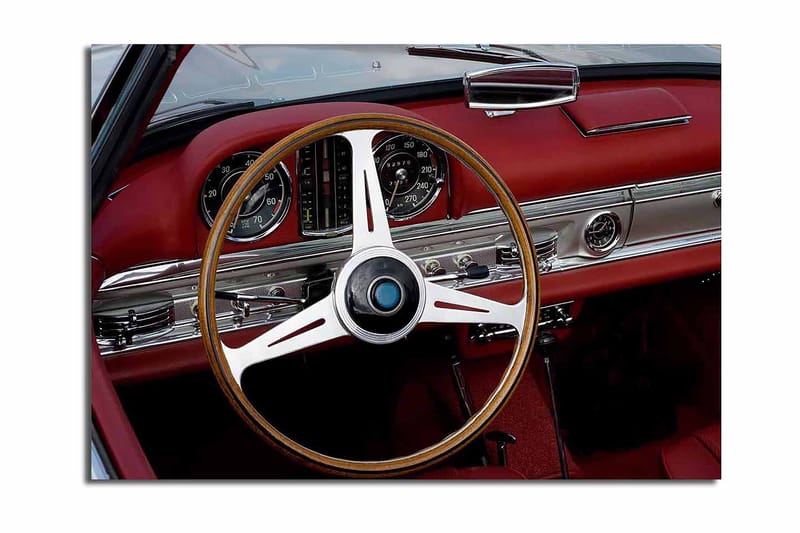 Lerretsbilde 70x100 cm - Klassisk bilinteriør med fokus på rattet og dashbordet, Rød / Sølv / Svart
