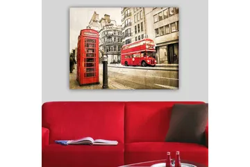 Lerretsbilde 70x100 cm - Klassisk rød telefonkiosk og en rød dobbeltdekkerbuss på en bygate - Rød / Grå - Interiør - Maleri & posters - Lerretsbilder