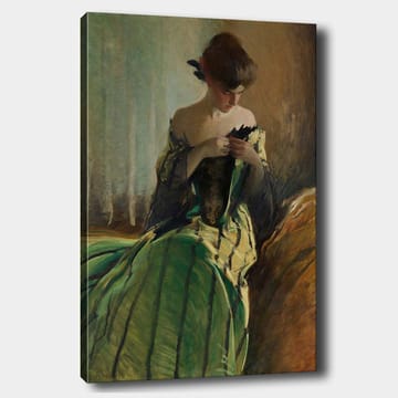 Lerretsbilde 70x100 cm - Kvinne i grønn kjole sitter og arbeider med noe i hendene, dypt fordypet i tanker - Grønn / Svart / Beige - Interiør - Maleri & posters - Lerretsbilder