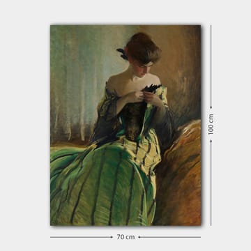 Lerretsbilde 70x100 cm - Kvinne i grønn kjole sitter og arbeider med noe i hendene, dypt fordypet i tanker - Grønn / Svart / Beige - Interiør - Maleri & posters - Lerretsbilder