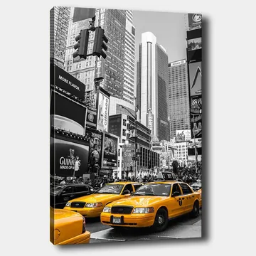 Lerretsbilde 70x100 cm - Livlig bybilde med gule drosjer som dominerer gaten i et urbant miljø - Gul / Svart - Interiør - Maleri & posters - Lerretsbilder