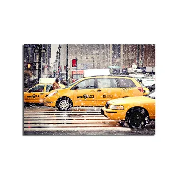 Lerretsbilde 70x100 cm - Livlig bybilde med gule drosjer som kjører gjennom snøfall i New York City - Gul / Svart - Interiør - Maleri & posters - Lerretsbilder