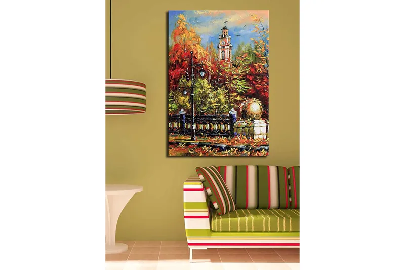 Lerretsbilde 70x100 cm - Livlig høstscene med et klokketårn i bakgrunnen omgitt av fargerike trær og lys - Rød / Oransje / Grønn - Interiør - Maleri & posters - Lerretsbilder