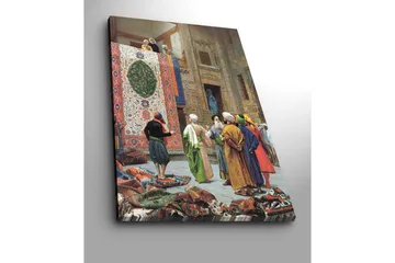 Lerretsbilde 70x100 cm - Livlig markedsscene med menn som diskuterer og beundrer et stort, fargerikt teppe - Rød / Grønn / Blå - Interiør - Maleri & posters - Lerretsbilder