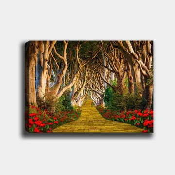 Lerretsbilde 70x100 cm - Magisk sti omkranset av blomster som fører gjennom en tunnel av trær - Gul / Grønn / Rød - Interiør - Maleri & posters - Lerretsbilder