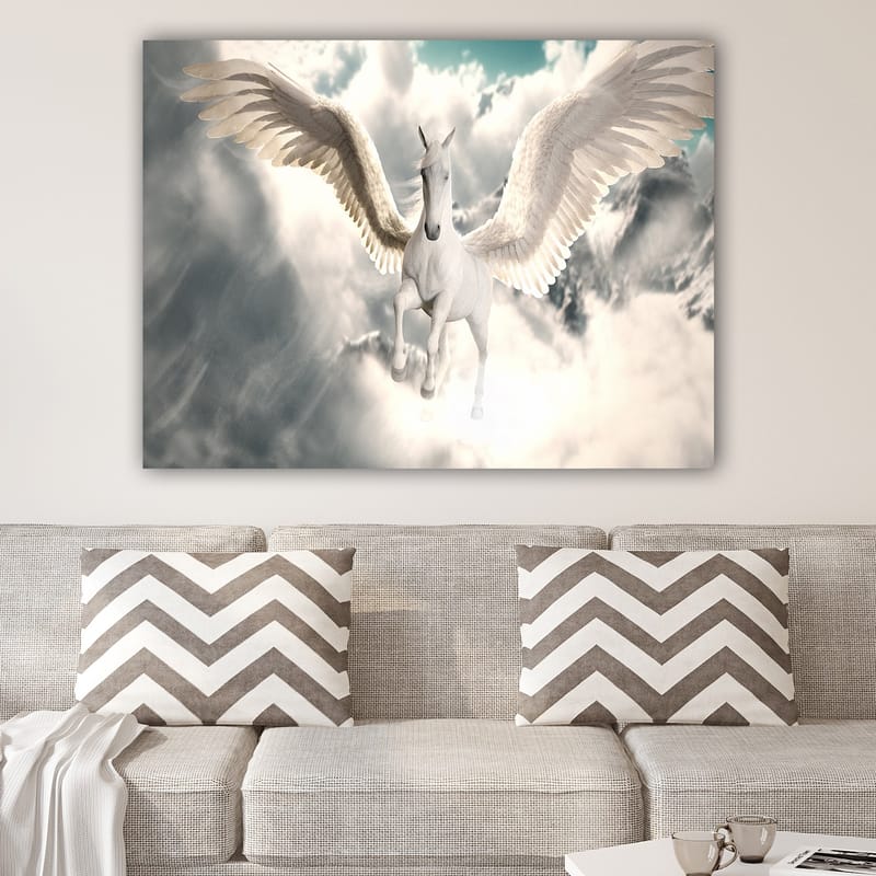 Lerretsbilde 70x100 cm - Majestetisk vinget enhjørning som svever gjennom skyene - Hvit / Lys blå / Grå - Interiør - Maleri & posters - Lerretsbilder