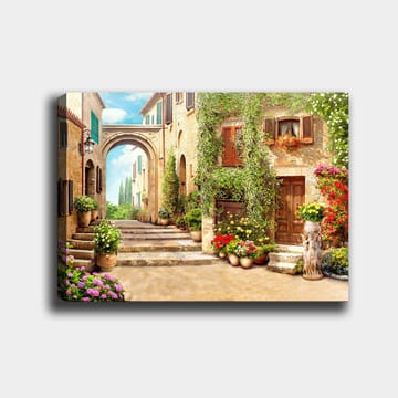 Lerretsbilde 70x100 cm - Malerisk gate med blomster og grøntområder i sjarmerende landsbymiljø - Grønn / Gul / Rosa - Interiør - Maleri & posters - Lerretsbilder