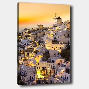 Lerretsbilde 70x100 cm - Malerisk utsikt over Santorini med hvite hus og en vindmølle i solnedgangens lys - Hvit / Gul / Oransje - Interiør - Maleri & posters - Lerretsbilder
