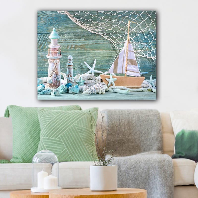 Lerretsbilde 70x100 cm - Maritim scene med seilbåt, fyr og sjøstjerne i strandomgivelser, Blå / Hvit / Beige