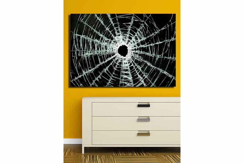 Lerretsbilde 70x100 cm - Nærbilde av en sprukket glassrute med et hull i midten og sprekker som strekker seg utover - Svart / Gjennomsiktig - Interiør - Maleri & posters - Lerretsbilder