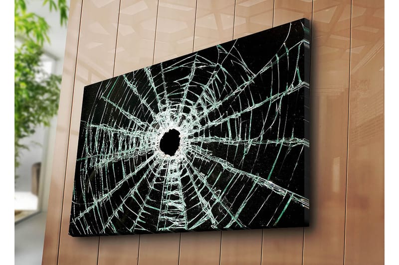 Lerretsbilde 70x100 cm - Nærbilde av en sprukket glassrute med et hull i midten og sprekker som strekker seg utover - Svart / Gjennomsiktig - Interiør - Maleri & posters - Lerretsbilder