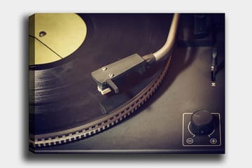 Lerretsbilde 70x100 cm - Nærbilde av en platespiller med vinylplate og tonearm - Svart / Grå / Gul - Interiør - Maleri & posters - Lerretsbilder