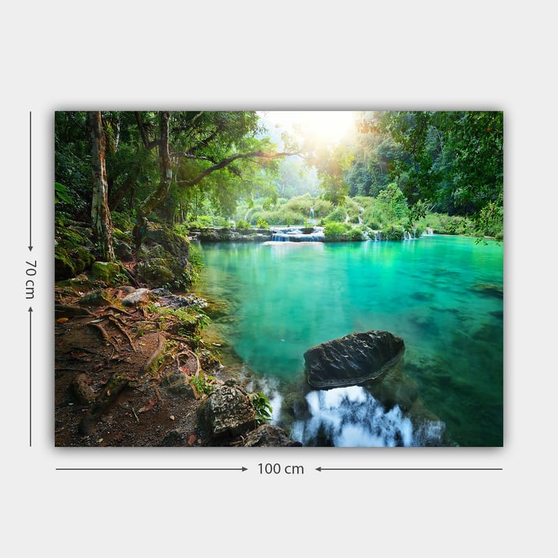 Lerretsbilde 70x100 cm - Rolig og naturskjønt fossefall med klart, turkis vann omgitt av frodig grøntområde - Turkis / Grønn / Brun - Interiør - Maleri & posters - Lerretsbilder