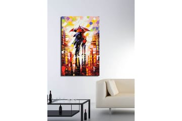 Lerretsbilde 70x100 cm - Romantisk scene med to personer som deler en paraply i et regnfullt bymiljø - Rød / Svart / Oransje - Interiør - Maleri & posters - Lerretsbilder