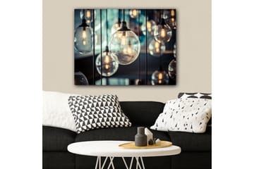 Lerretsbilde 70x100 cm - Samling av hengende lyspærer i forskjellige størrelser som skaper en atmosfære av varme og lys - Klar / Svart / Gull - Interiør - Maleri & posters - Lerretsbilder