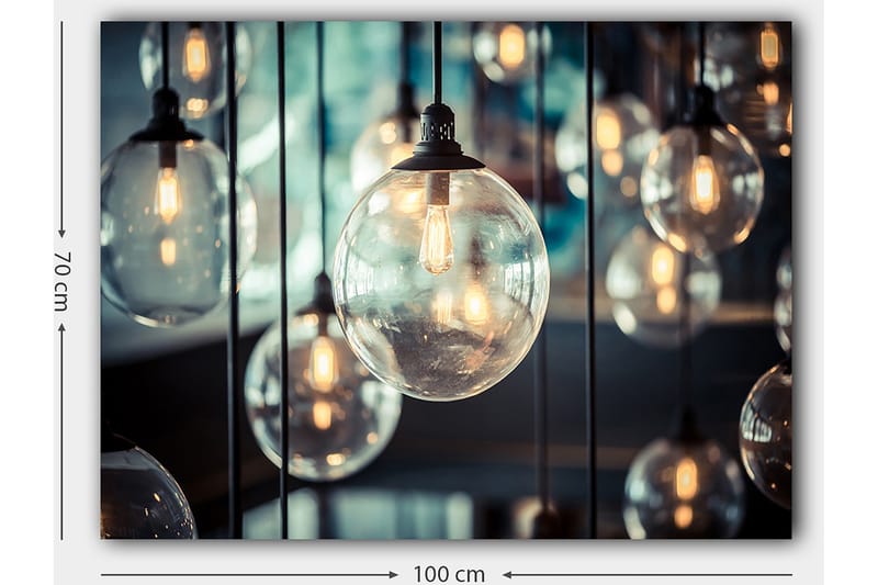 Lerretsbilde 70x100 cm - Samling av hengende lyspærer i forskjellige størrelser som skaper en atmosfære av varme og lys - Klar / Svart / Gull - Interiør - Maleri & posters - Lerretsbilder