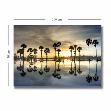 Lerretsbilde 70x100 cm - Silhuetter av palmer ved en speilblank innsjø i solnedgang - Gull / Blå / Svart - Interiør - Maleri & posters - Lerretsbilder