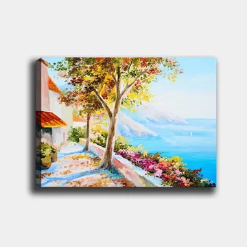 Lerretsbilde 70x100 cm - Solrik kyststi med fargerike trær og blomster som fører ned til havet - Blå / Grønn / Oransje - Interiør - Maleri & posters - Lerretsbilder