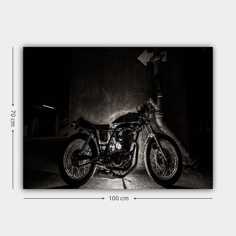 Lerretsbilde 70x100 cm - Stilig motorsykkel i et urbant miljø med fokus på detaljer og skygger - Svart / Grå - Interiør - Maleri & posters - Lerretsbilder