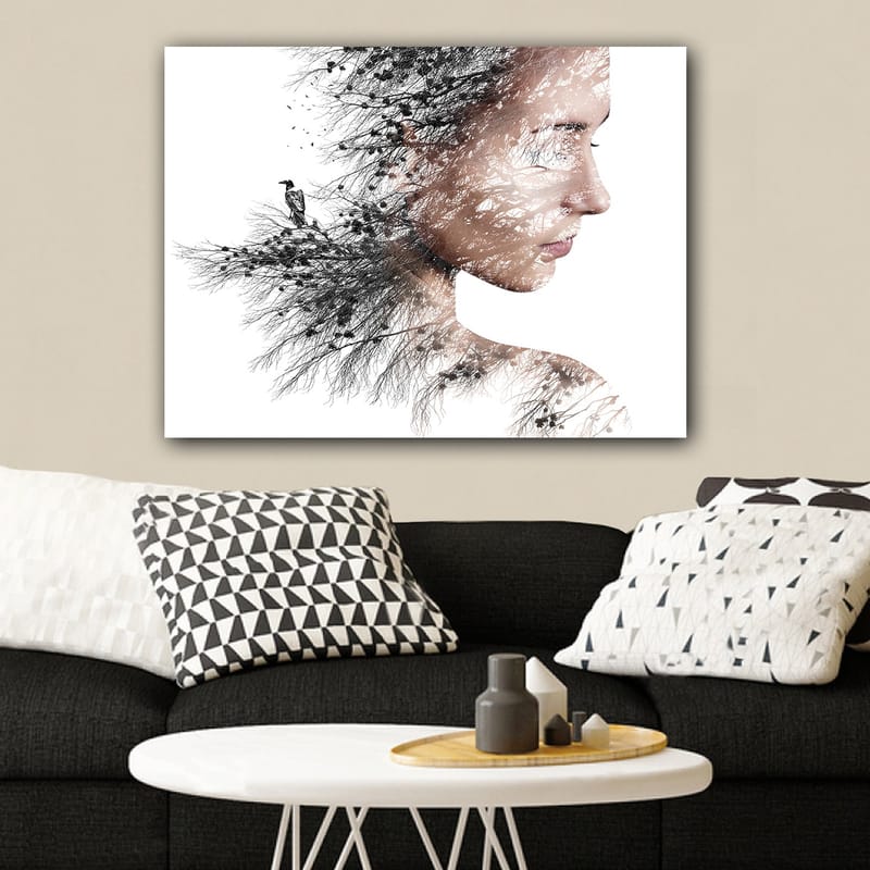 Lerretsbilde 70x100 cm - Stilisert portrett av en kvinne med trær og fugler som en del av silhuetten hennes - Svart / Grå / Brun - Interiør - Maleri & posters - Lerretsbilder