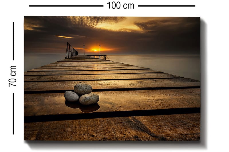 Lerretsbilde 70x100 cm - Stille brygge ved solnedgang med steiner i forgrunnen - Gull / Brun / Grå - Interiør - Maleri & posters - Lerretsbilder