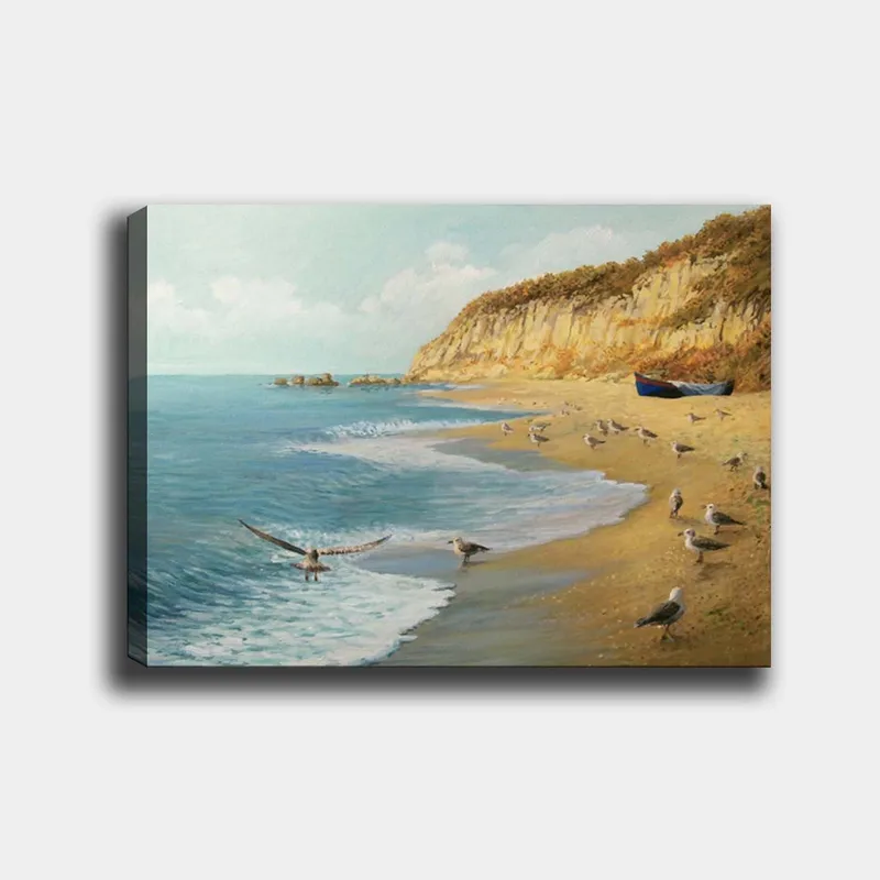 Lerretsbilde 70x100 cm - Strandmotiv med fugler som flyr og går langs vannet, omgitt av steiner og en båt på kysten, Blå / Beige / Grønn