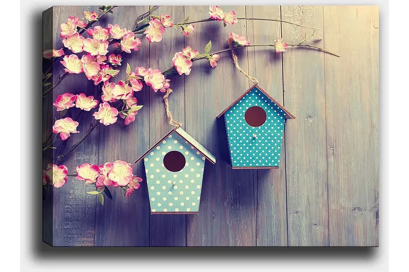 Lerretsbilde 70x100 cm - To fuglehus hengende på en gren med blomster i bakgrunnen - Rosa / Turkis - Interiør - Maleri & posters - Lerretsbilder