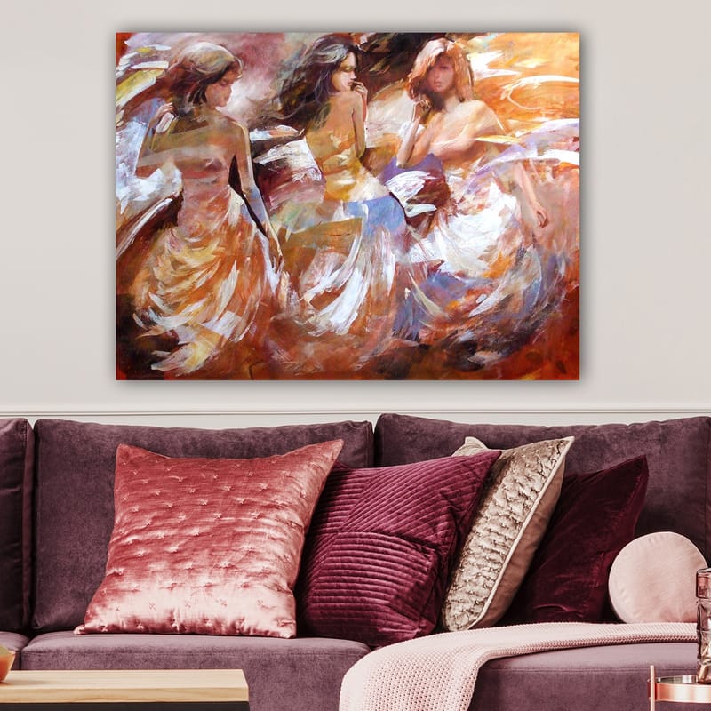 Lerretsbilde 70x100 cm - Tre kvinner i flagrende kjoler som danser, fanget i en dynamisk bevegelse - Oransje / Hvit / Beige - Interiør - Maleri & posters - Lerretsbilder