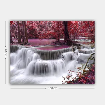 Lerretsbilde 70x100 cm - Vakker foss omgitt av fargerike trær og vegetasjon - Rød / Lilla / Hvit - Interiør - Maleri & posters - Lerretsbilder